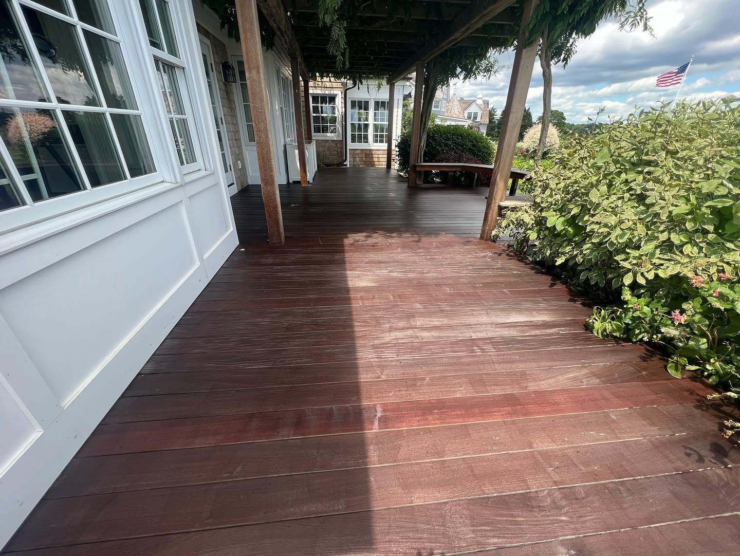 Waterfront deck after professional staining and restoration